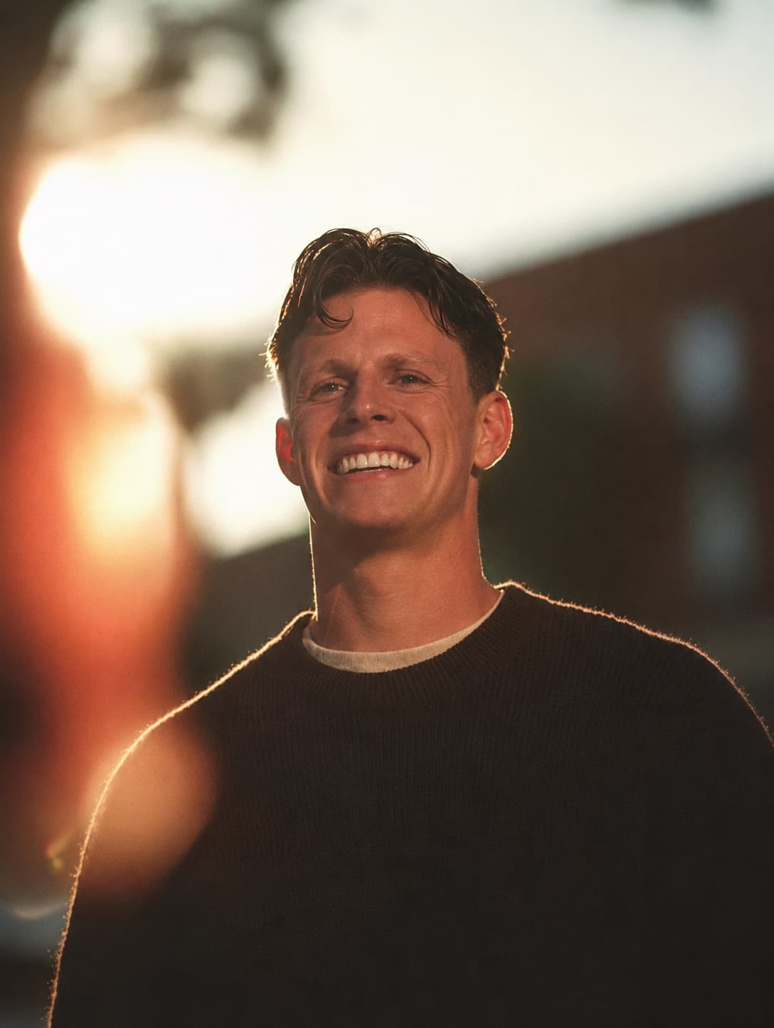 Nick, founder of Upshift Automations, smiling in golden-hour light.